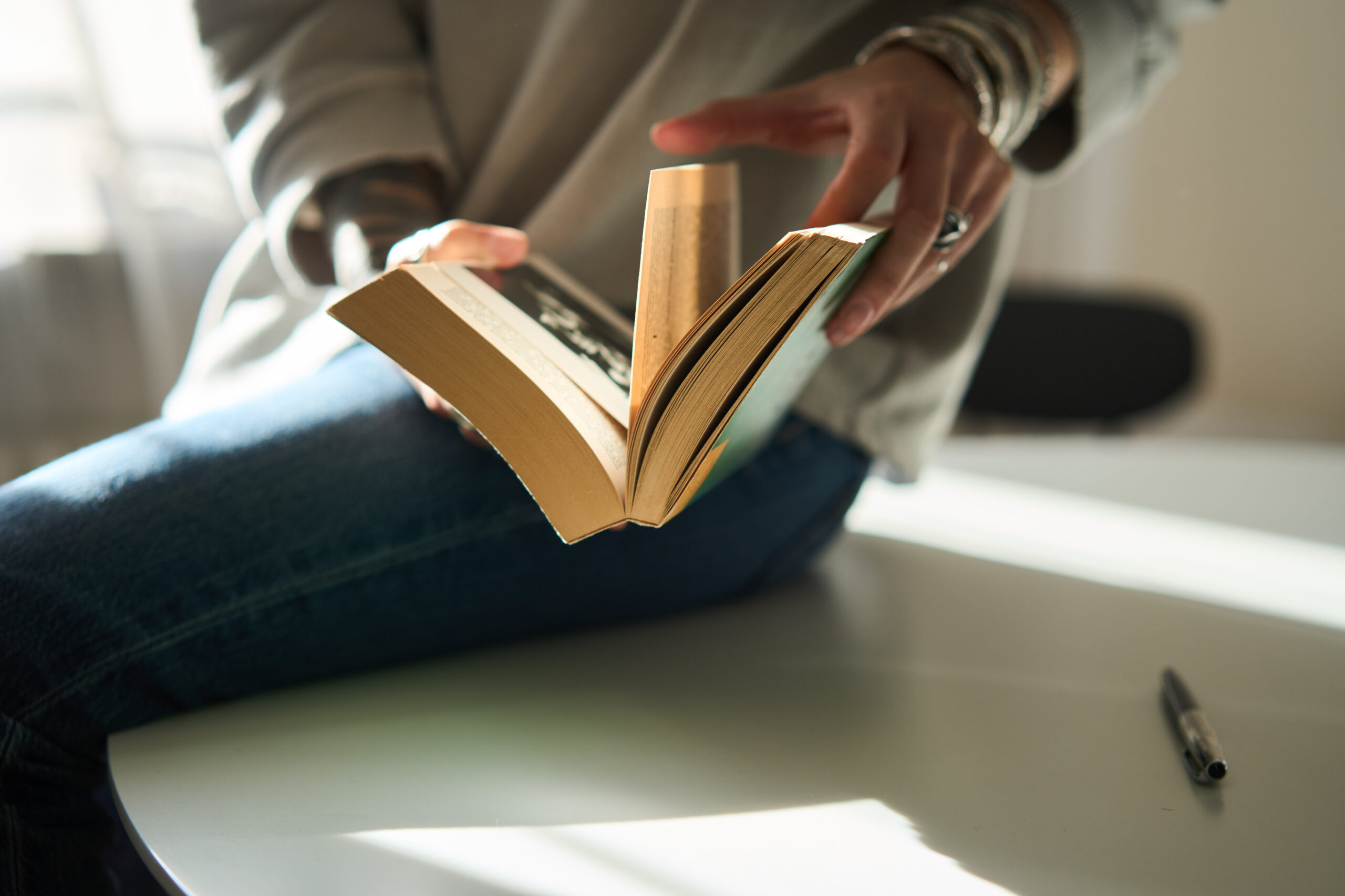 hands holding a book